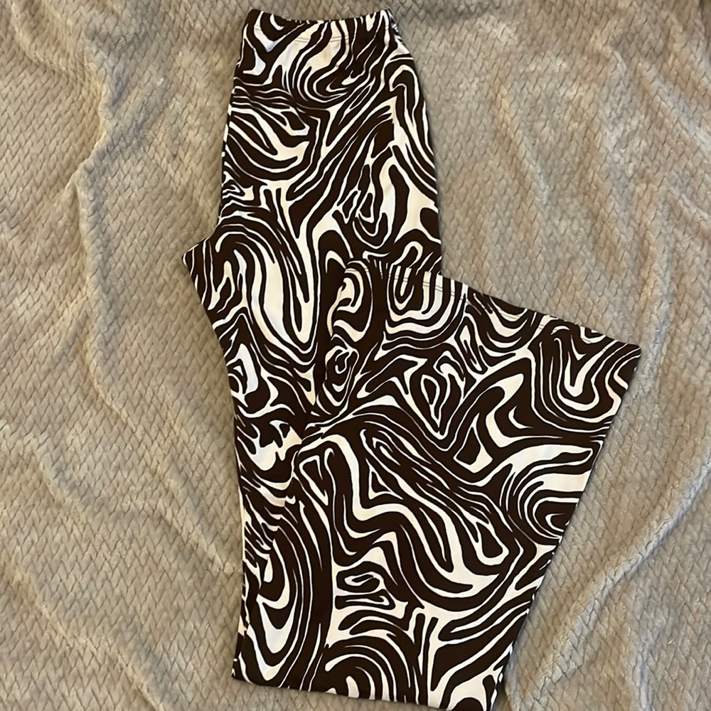 Brown and white print flare pants